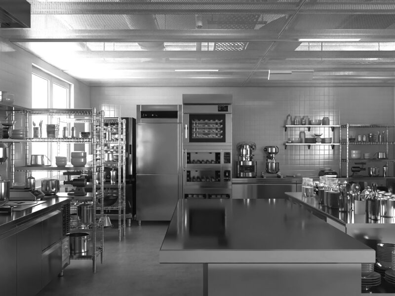 Empty,Clean,Stainless,Steel,Island,Table,In,Commercial,,Professional,Bakery