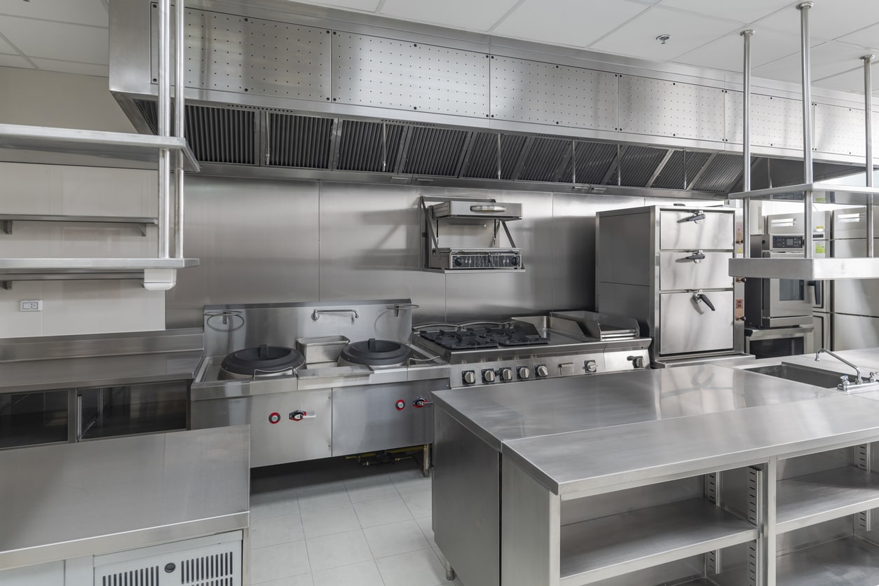 commercial kitchen area with professional cooking ranges