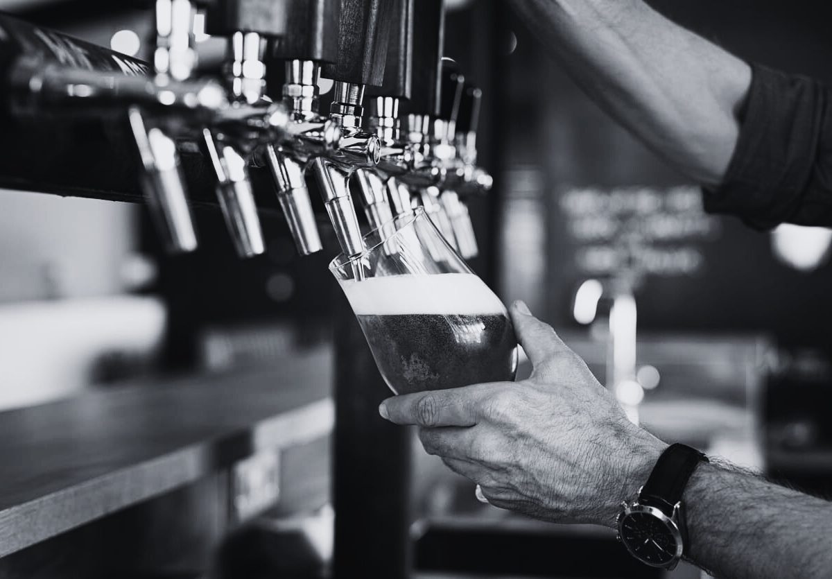 pulling beer at pub